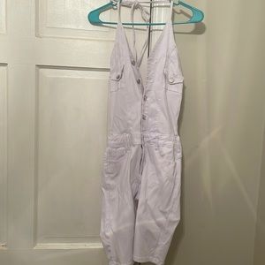 Button down jumpsuit that ties over the neck